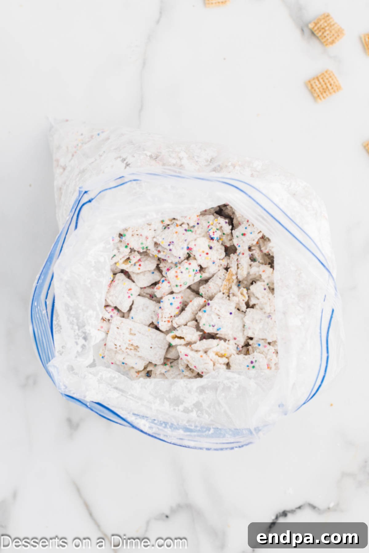 Birthday Cake Snack Mix 6 Cereal added to mixture.