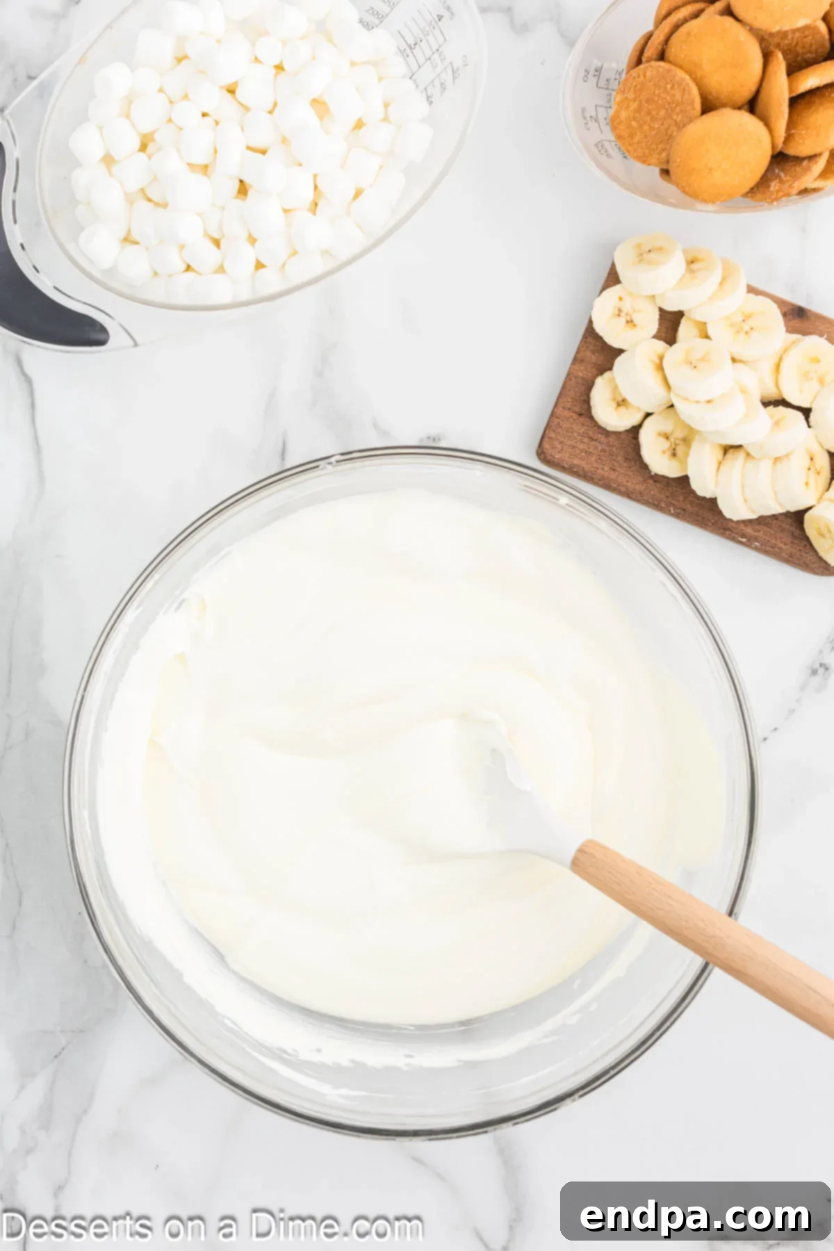 Cool whip folded together in a bowl. 