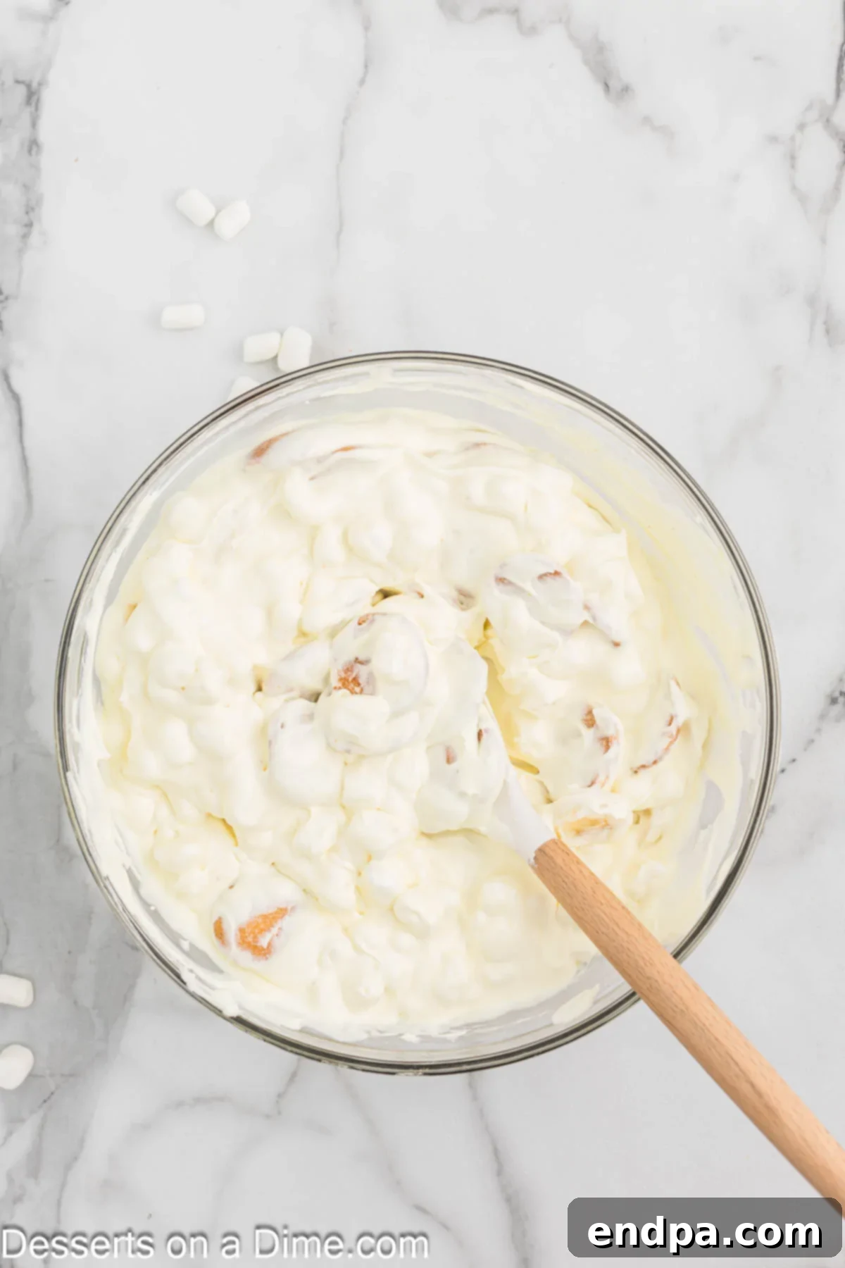 Mixture combined together with a spatula. 