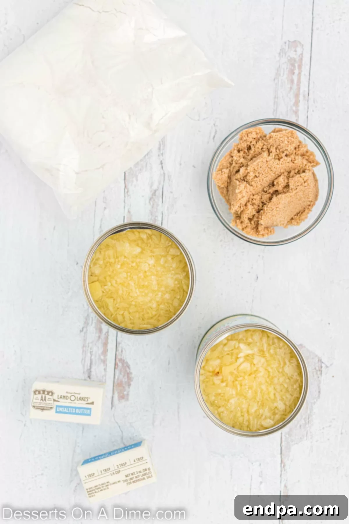 Ingredients for Pineapple dump cake- crushed pineapple, yellow cake mix, brown sugar, butter, ice cream. 