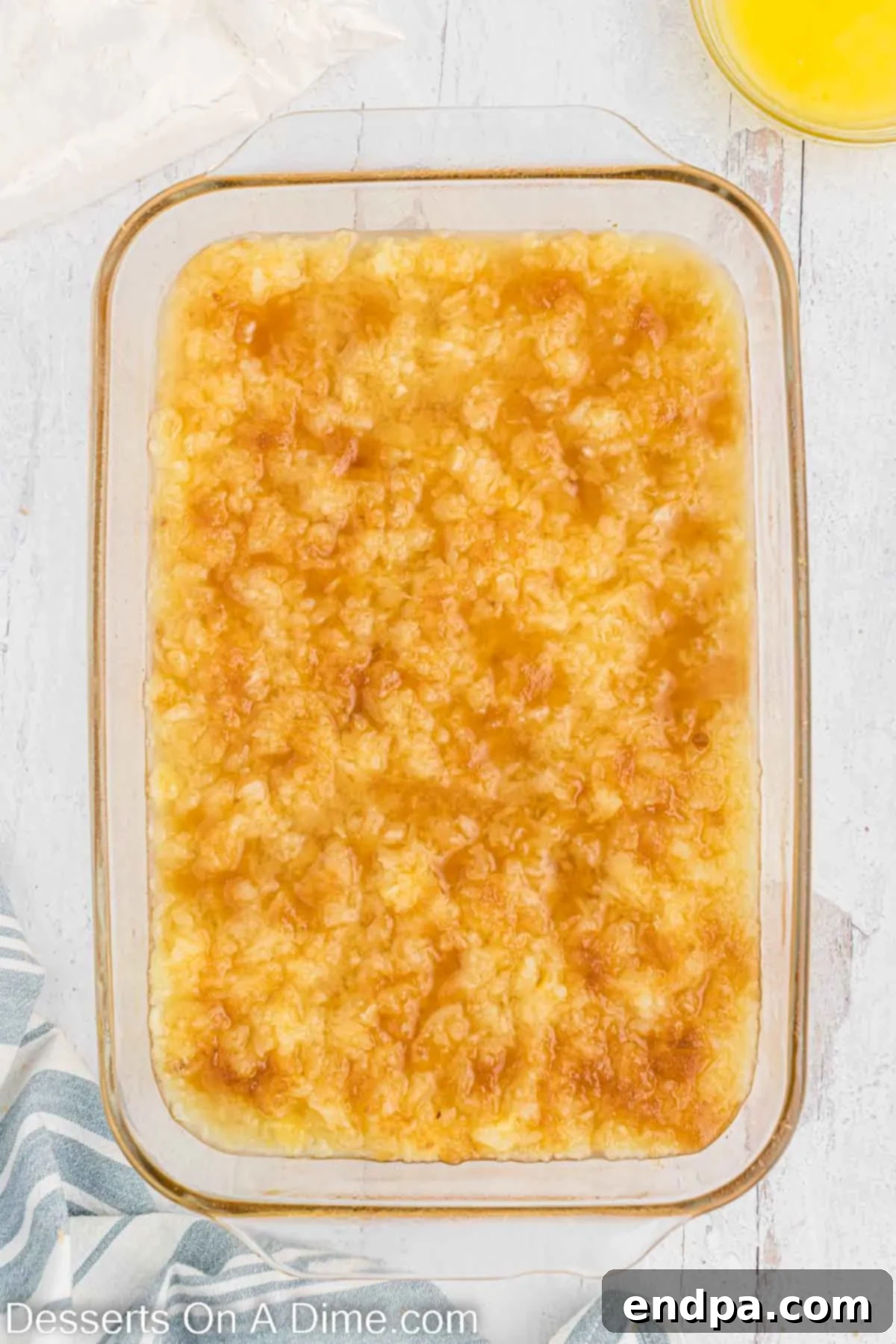 Crushed pineapple in a baking dish. 