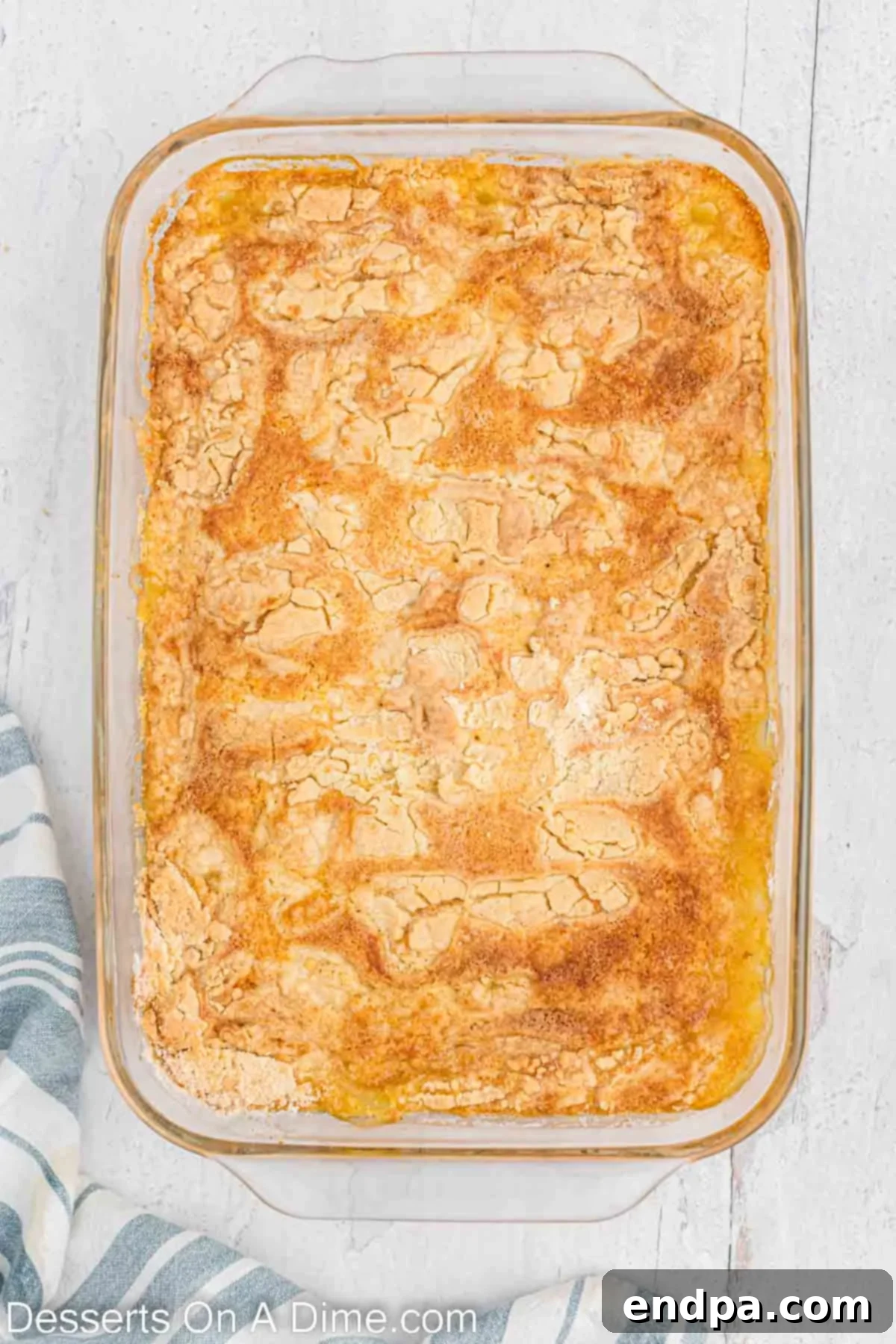 Cake baked and cooling in dish. 