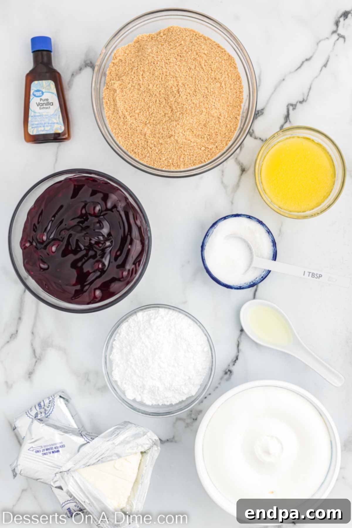 No bake blueberry cheesecake ingredients - graham cracker crusts, butter, sugar, cream cheese, powdered sugar, vanilla, lemon juice, cool whip, blueberry pie filling. 