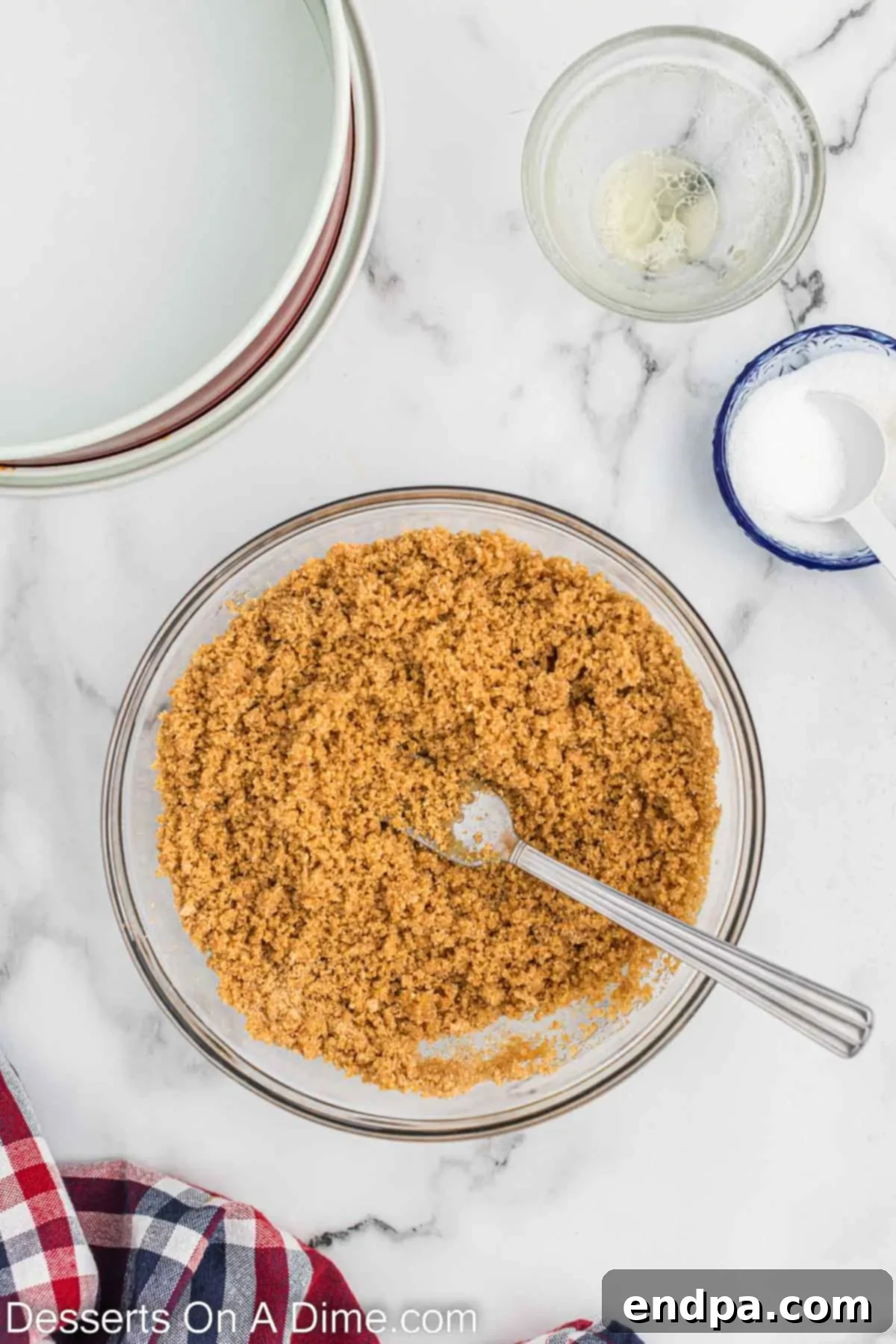 Pie crust ingredients combined in a bowl. 