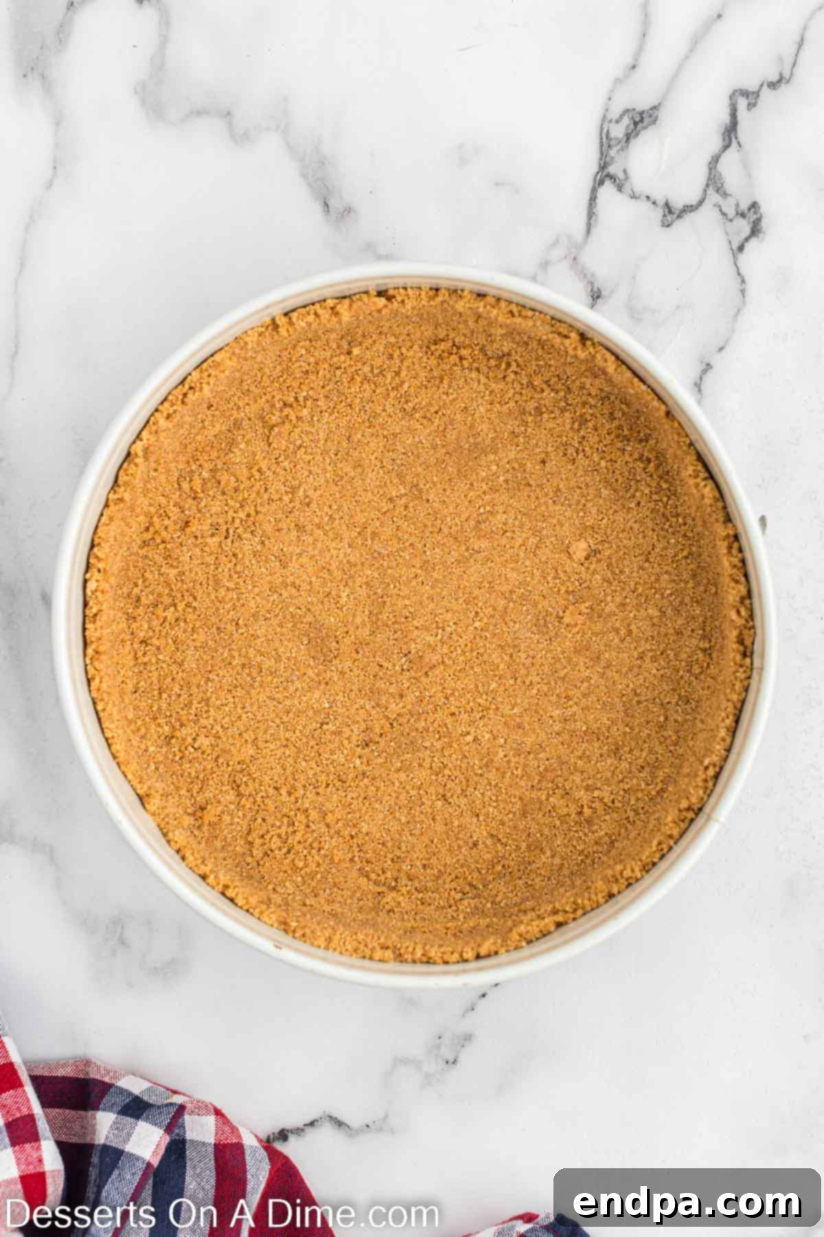 Graham cracker crust pressed into pie plate. 