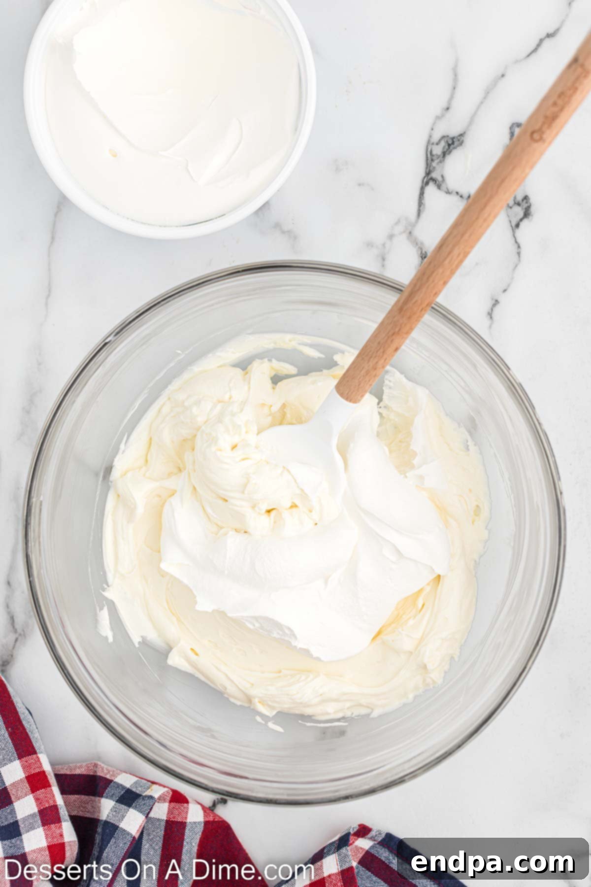 Cool whip folded into cream cheese mixture. 