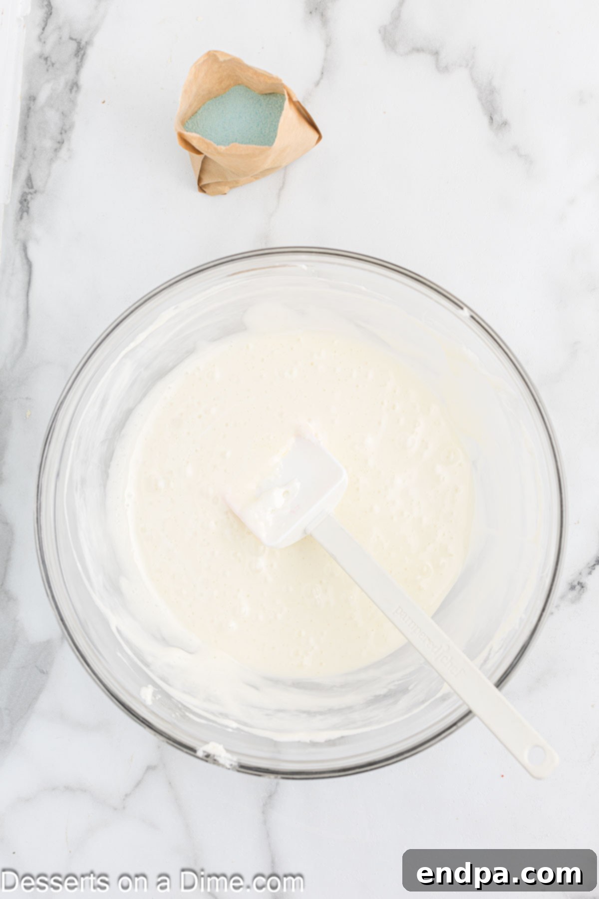 Melted marshmallow mixture in a bowl.