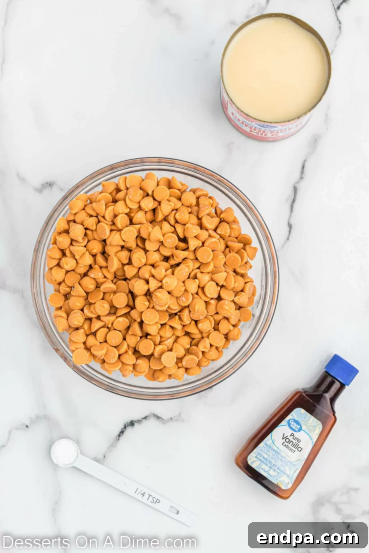 Golden Butterscotch Fudge 3 Ingredients for Butterscotch fudge - butterscotch fudge, vanilla, sweetened condensed milk, salt, laid out on a surface.