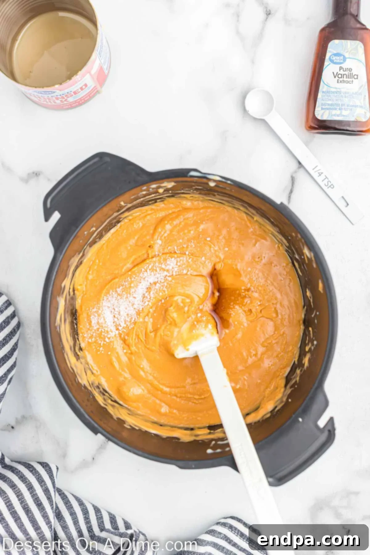 Golden Butterscotch Fudge 5 Melted butterscotch chips combined with sweetened condensed milk, forming a smooth mixture.