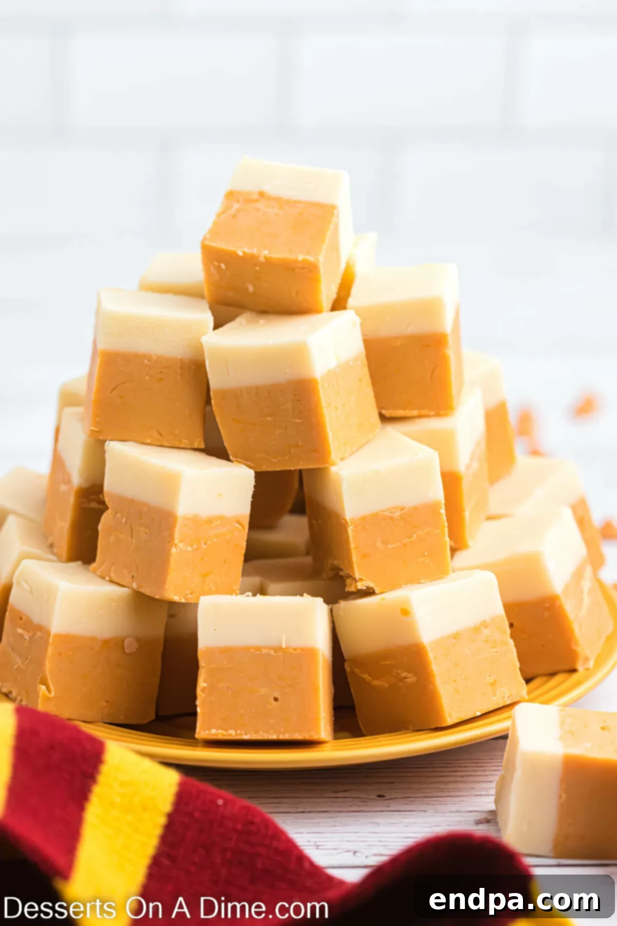 Dreamy Butterbeer Fudge 12 Many squares of Harry Potter butterbeer fudge neatly arranged, showcasing its two creamy layers.