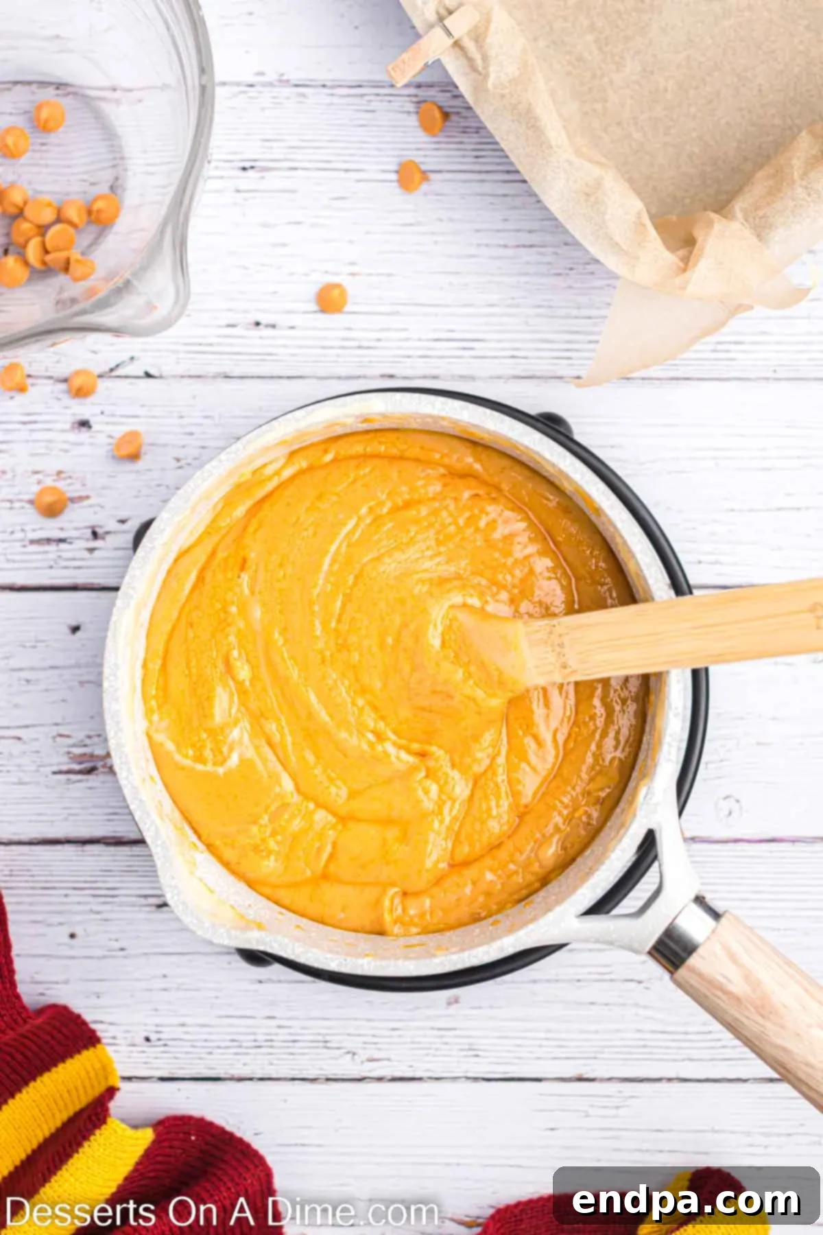 Dreamy Butterbeer Fudge 4 Saucepan with butterscotch mixture boiling gently, releasing sweet aromas.