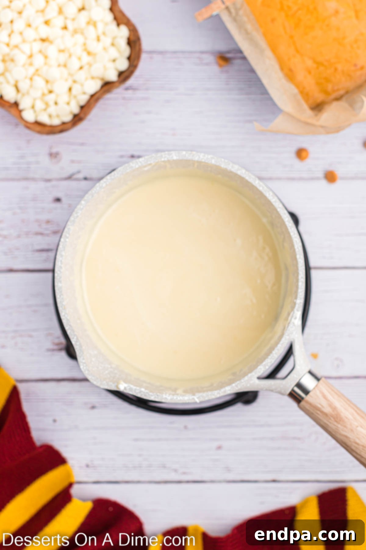 Dreamy Butterbeer Fudge 9 White chocolate chips fully melted and combined into a smooth, lustrous vanilla fudge mixture.