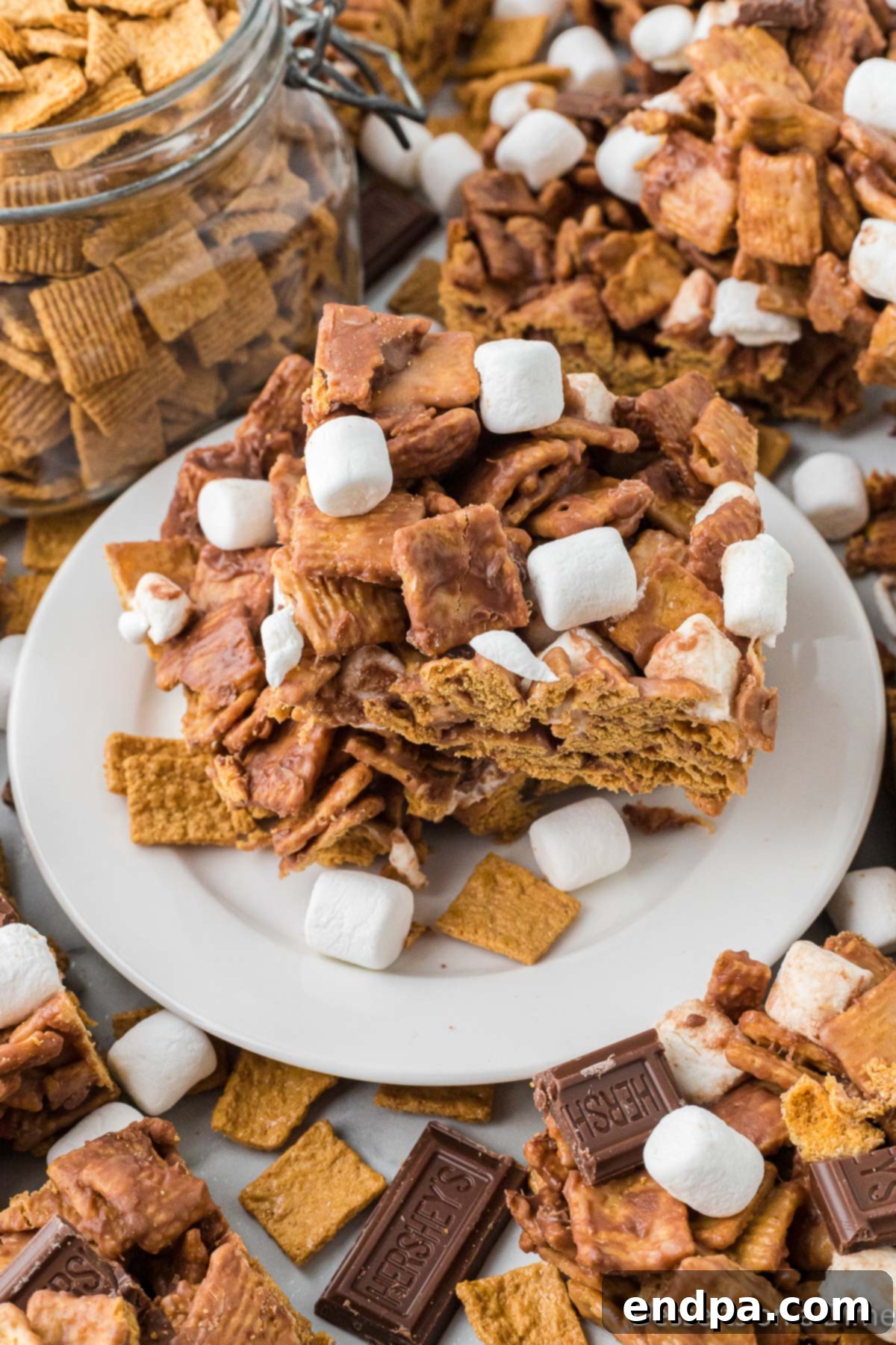 Finished Golden Graham S'mores Bars on a plate, cut into individual servings.