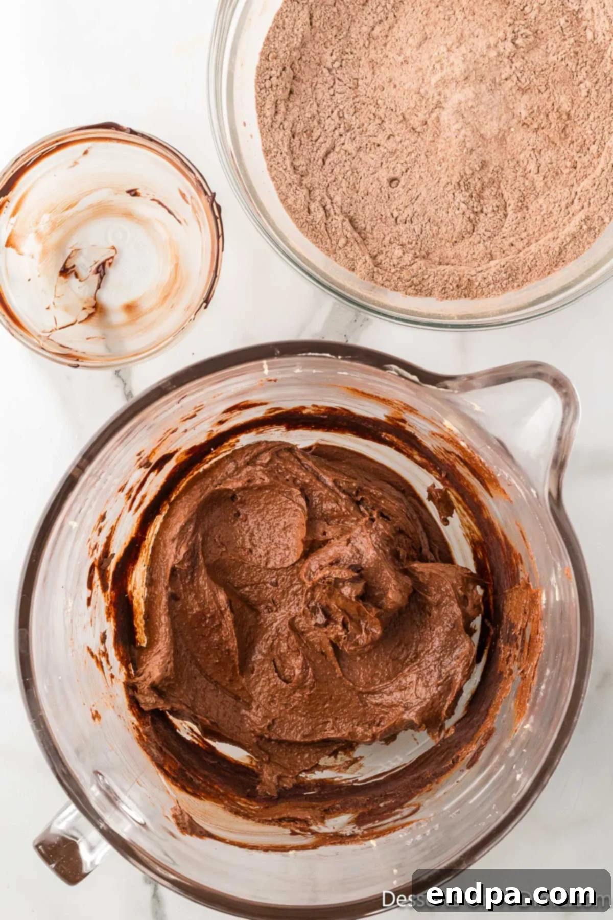 Crumbl Style Buckeye Brownie Cookies 11 Chocolate and peanut butter mixture combined together.