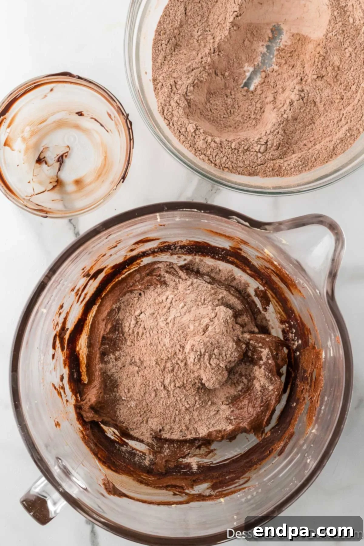 Crumbl Style Buckeye Brownie Cookies 12 Dry ingredients mixed into the wet ingredients.