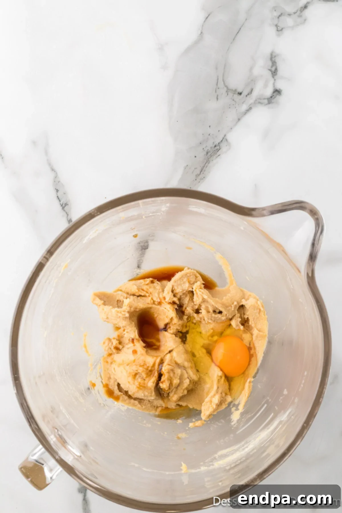 Crumbl Style Buckeye Brownie Cookies 8 Eggs and vanilla added into butter mixture.