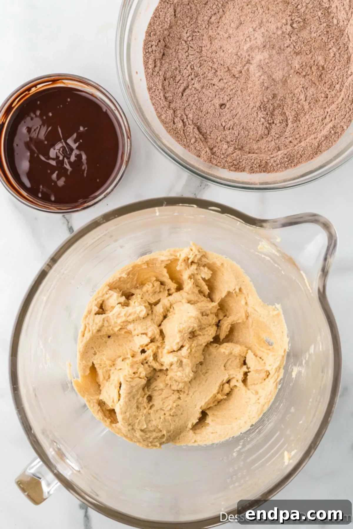 Crumbl Style Buckeye Brownie Cookies 9 Mixture combined in a bowl until smooth.
