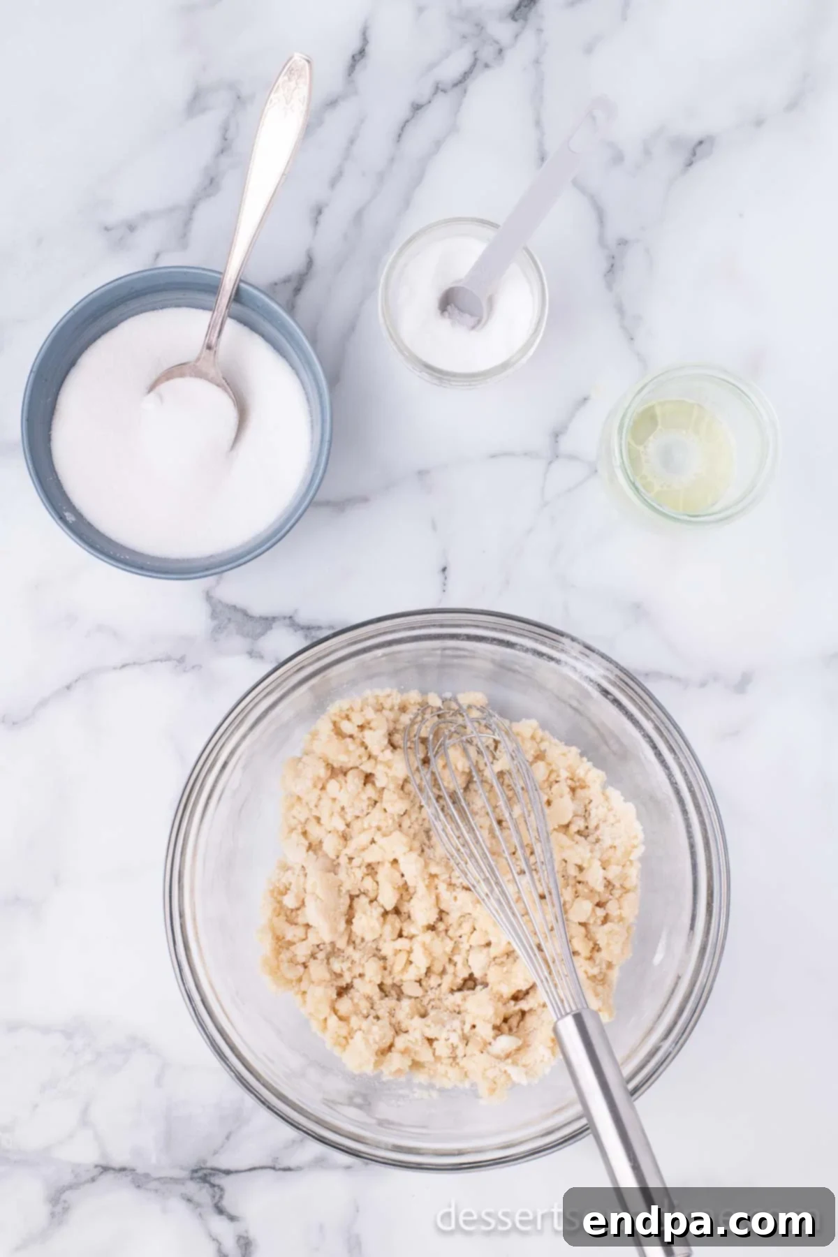 Krispy Kreme Donut Bites 8 Sugar and salt already mixed into the donut dough, showing a partially formed dough consistency.