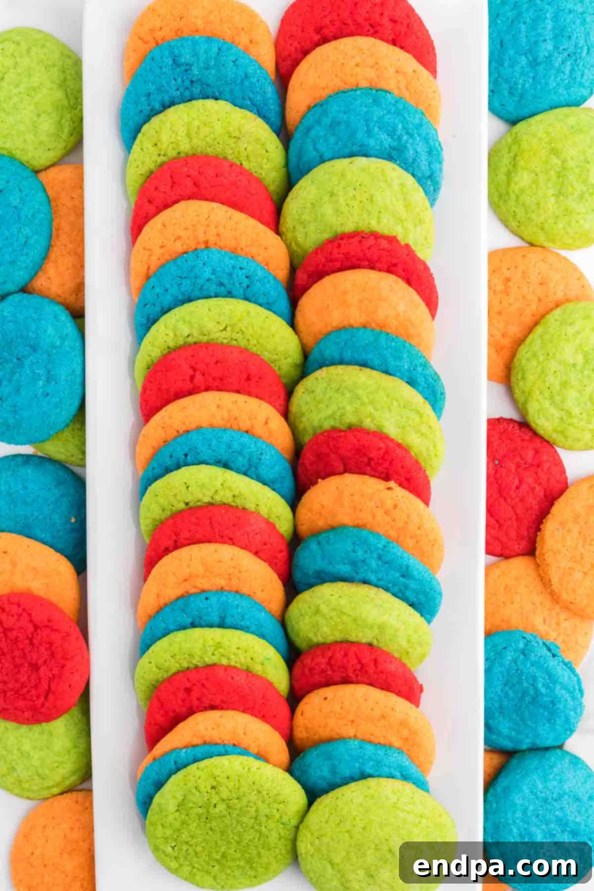 Vibrant Jello Bites 10 Jello sugar cookies arranged beautifully on a platter.