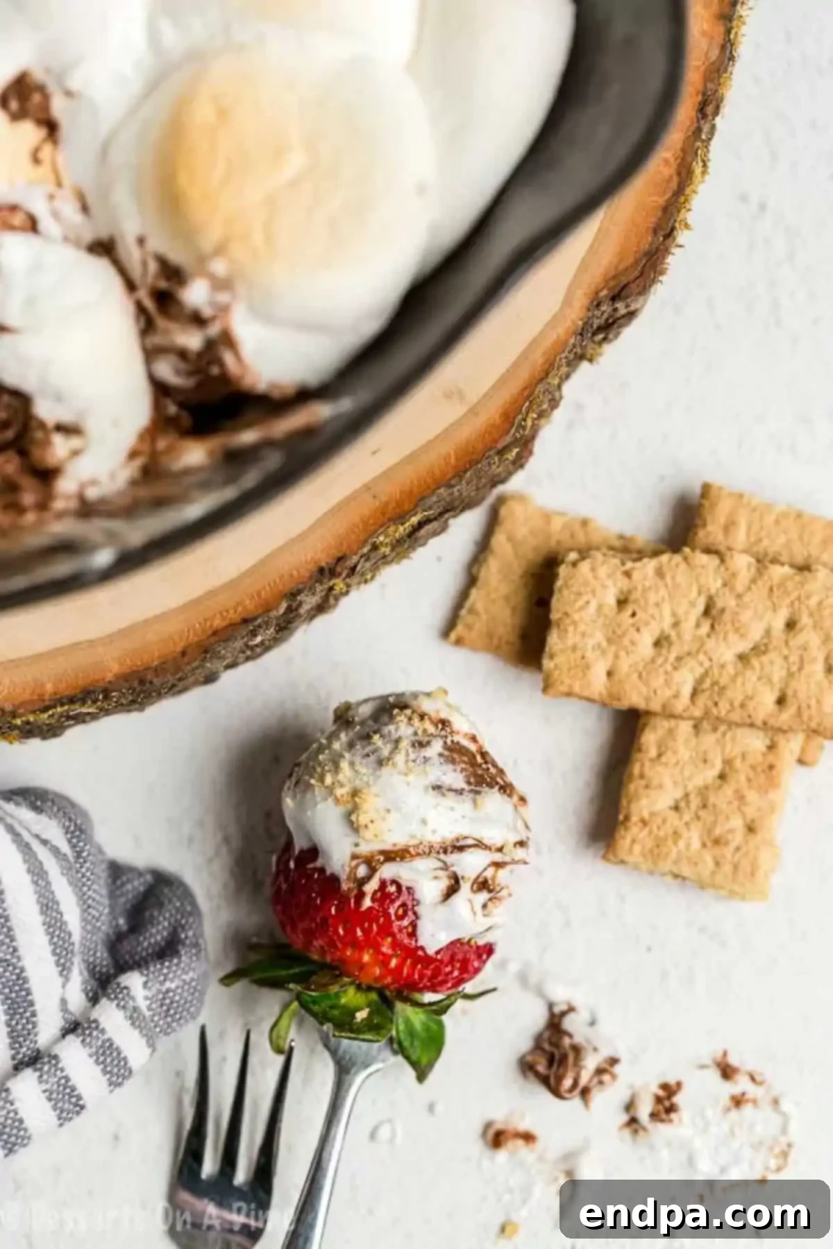Strawberry dipped in marshmallows.