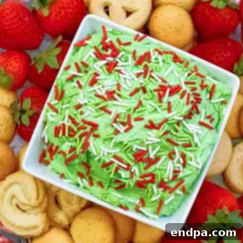Grinchmas Dessert Delights 13 A bowl of green Grinch Dip, ready to be served with dippers.