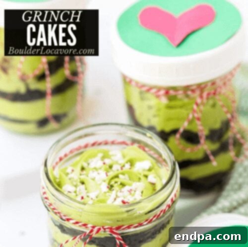 Grinchmas Dessert Delights 14 Mini Grinch Cakes with green frosting and a red heart.