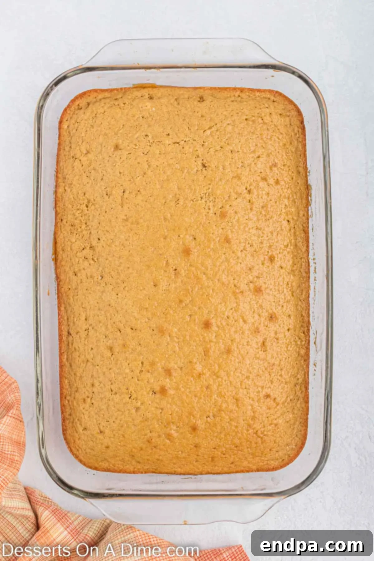 Butterscotch Bliss Cake 6 Baked butterscotch cake cooling in the 9x13 inch pan on a wire rack.