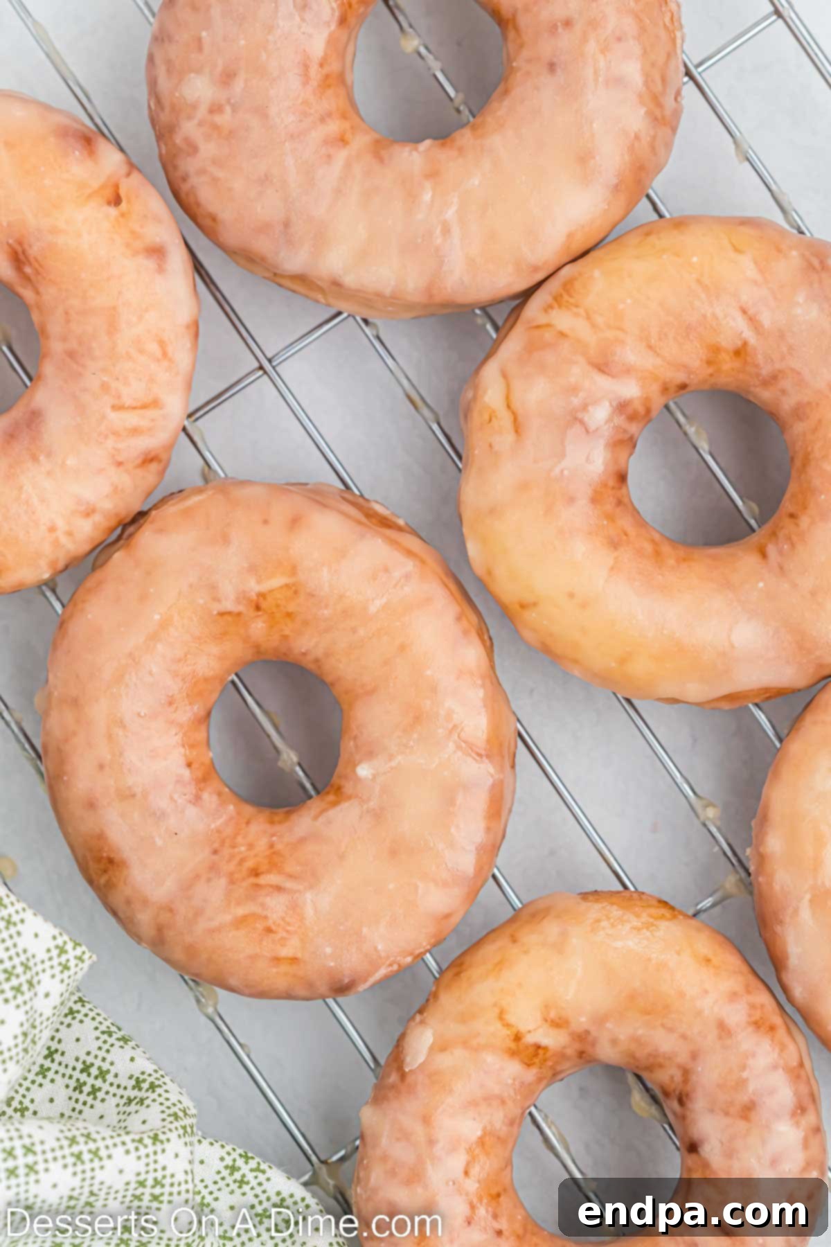 Krispy Kreme Donuts on cooling rack.