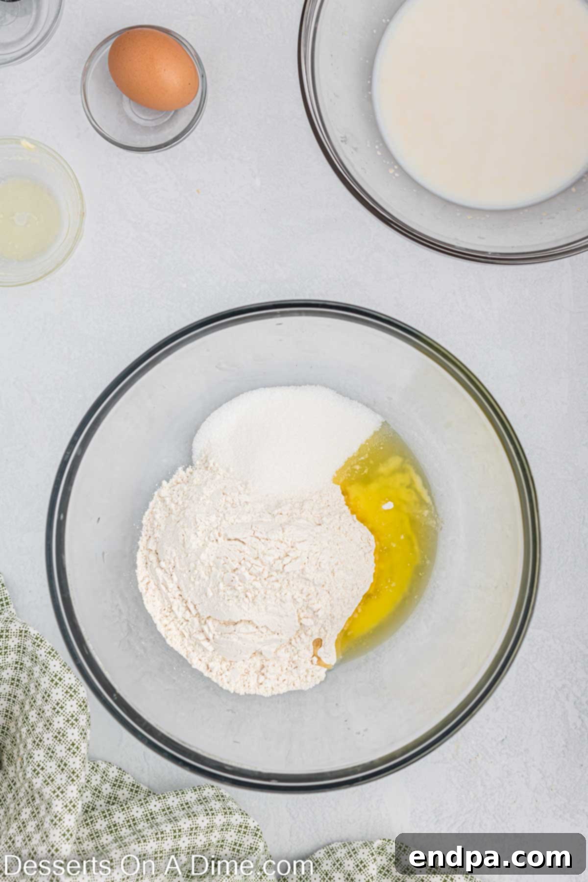 Separate bowl with melted butter, flour, sugar and salt.