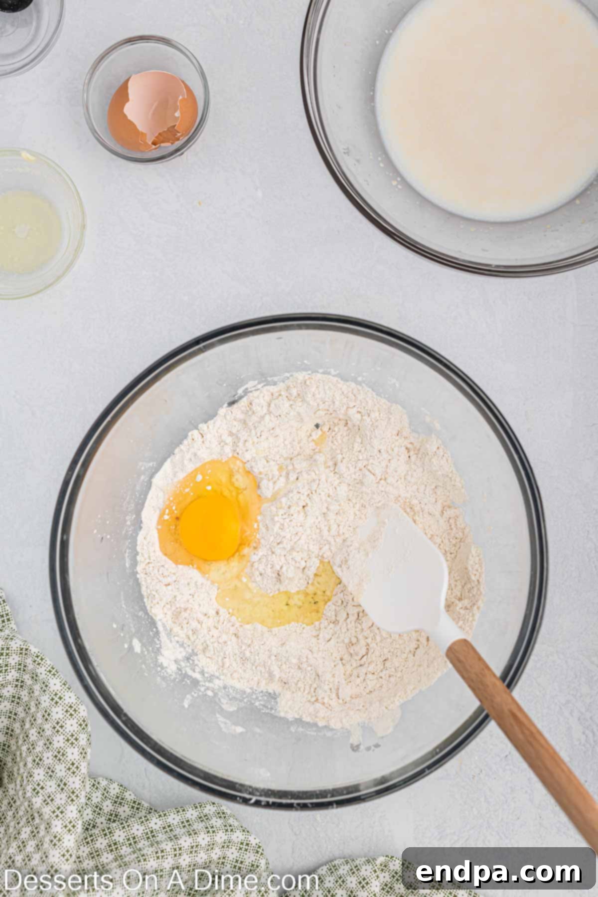 Egg and yeast mixed in the bowl.