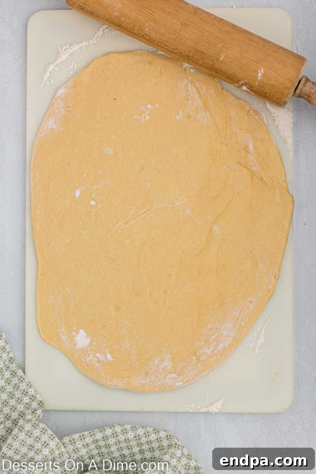 Dough rolled out on the counter.