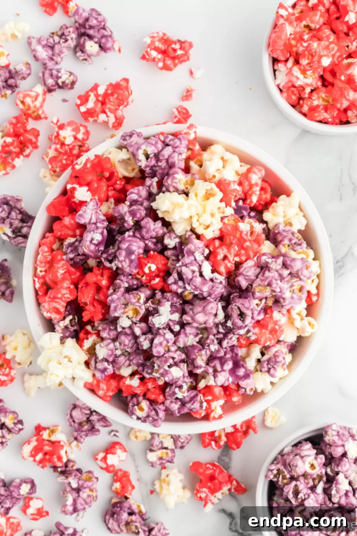 A bowl filled with brightly colored Kool-Aid popcorn, ready to be enjoyed.