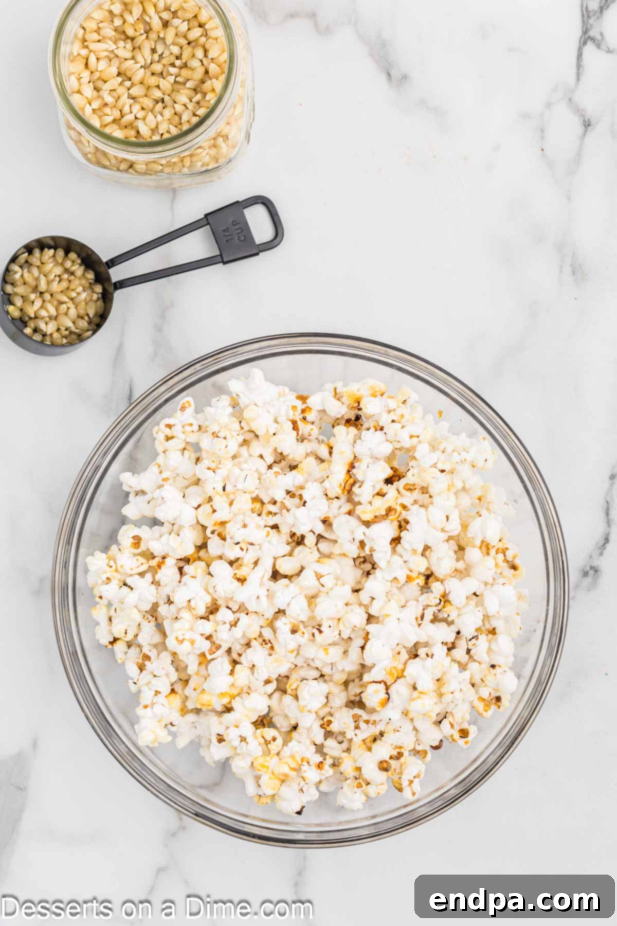 Sweet & Salty Kettle Corn 7 Freshly popped kettle corn transferred to a large mixing bowl.