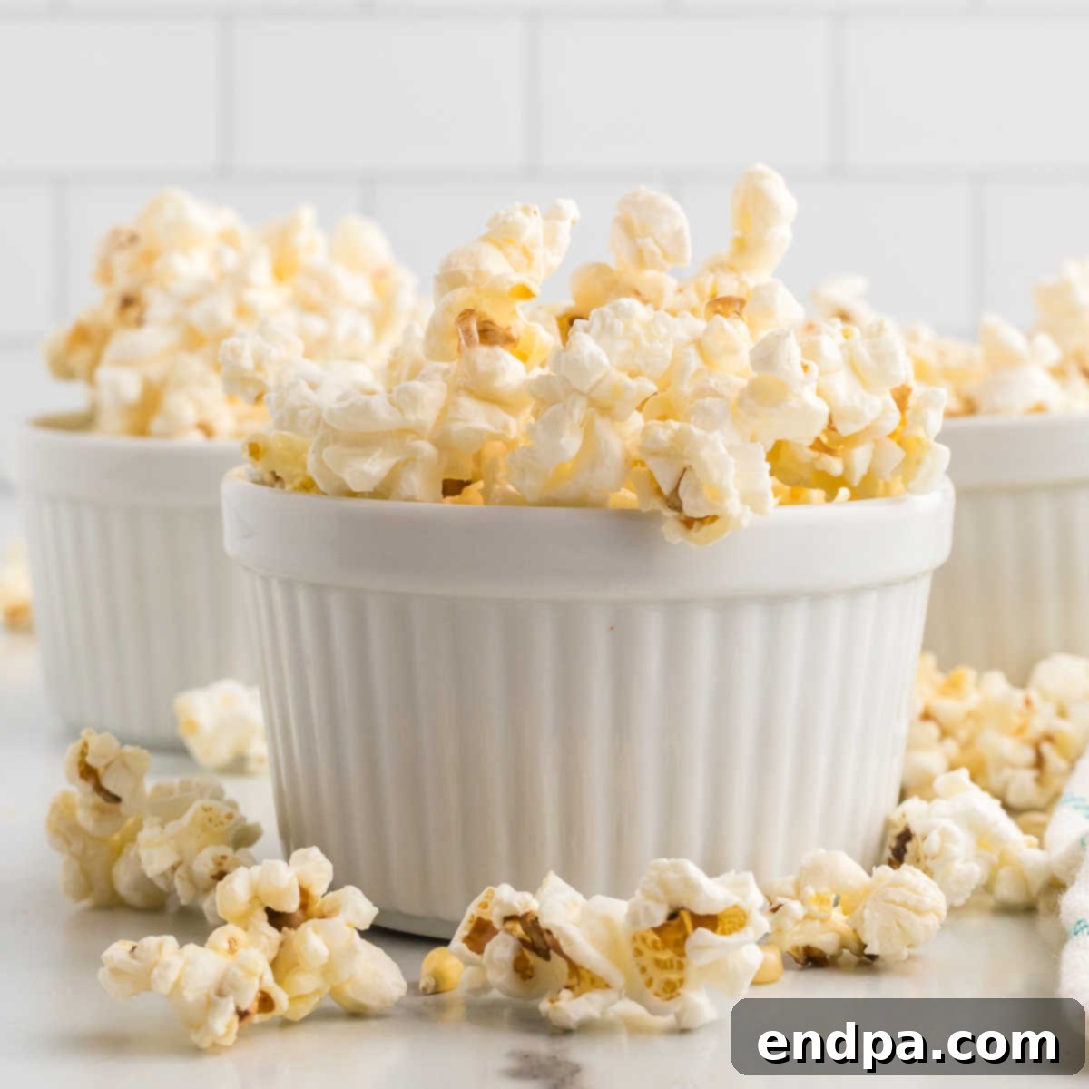 Sweet & Salty Kettle Corn 9 A square image of delicious kettle corn popcorn ready to be served.