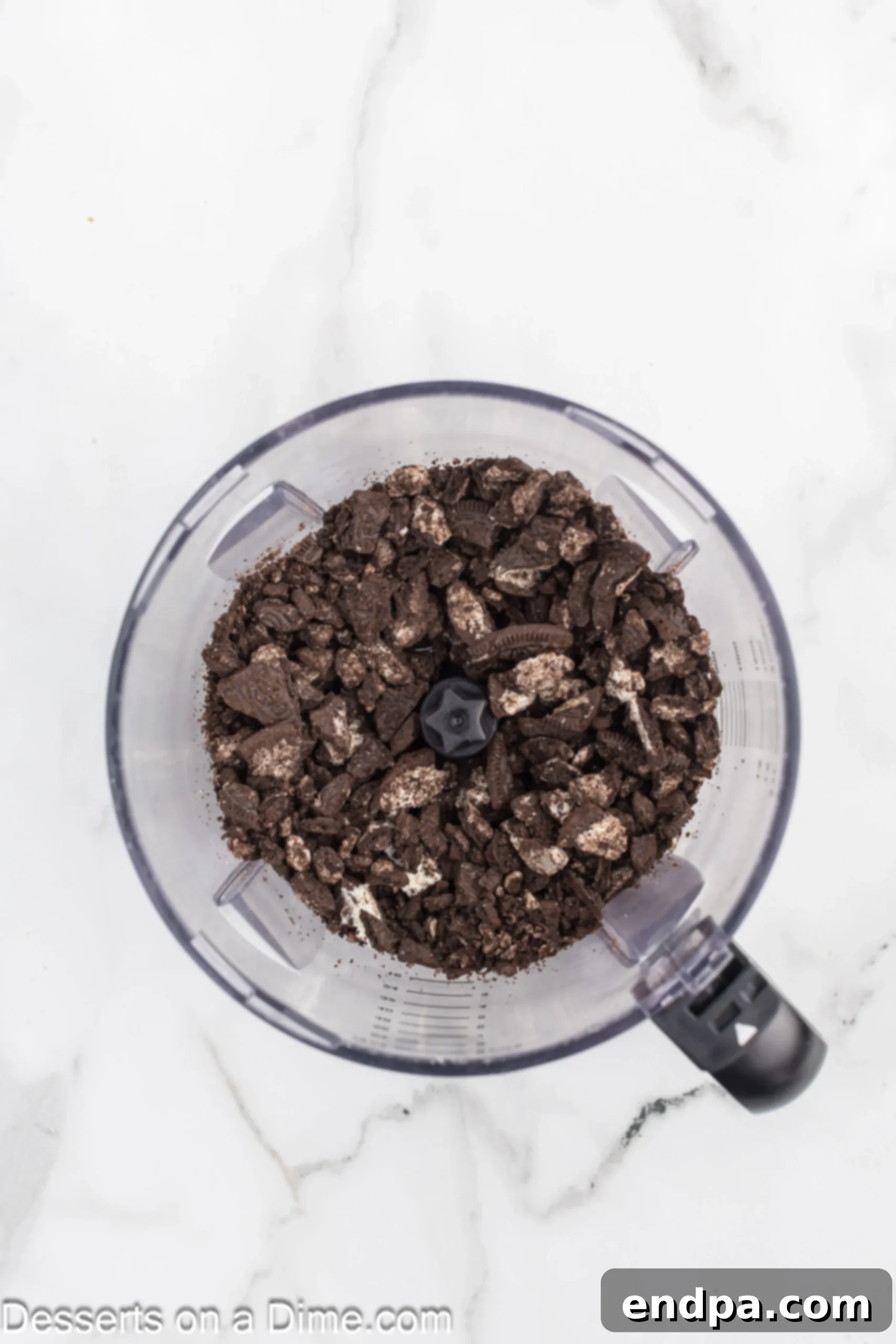 Oreo Popcorn Crunch 5 Oreo Cookies in a food processor.