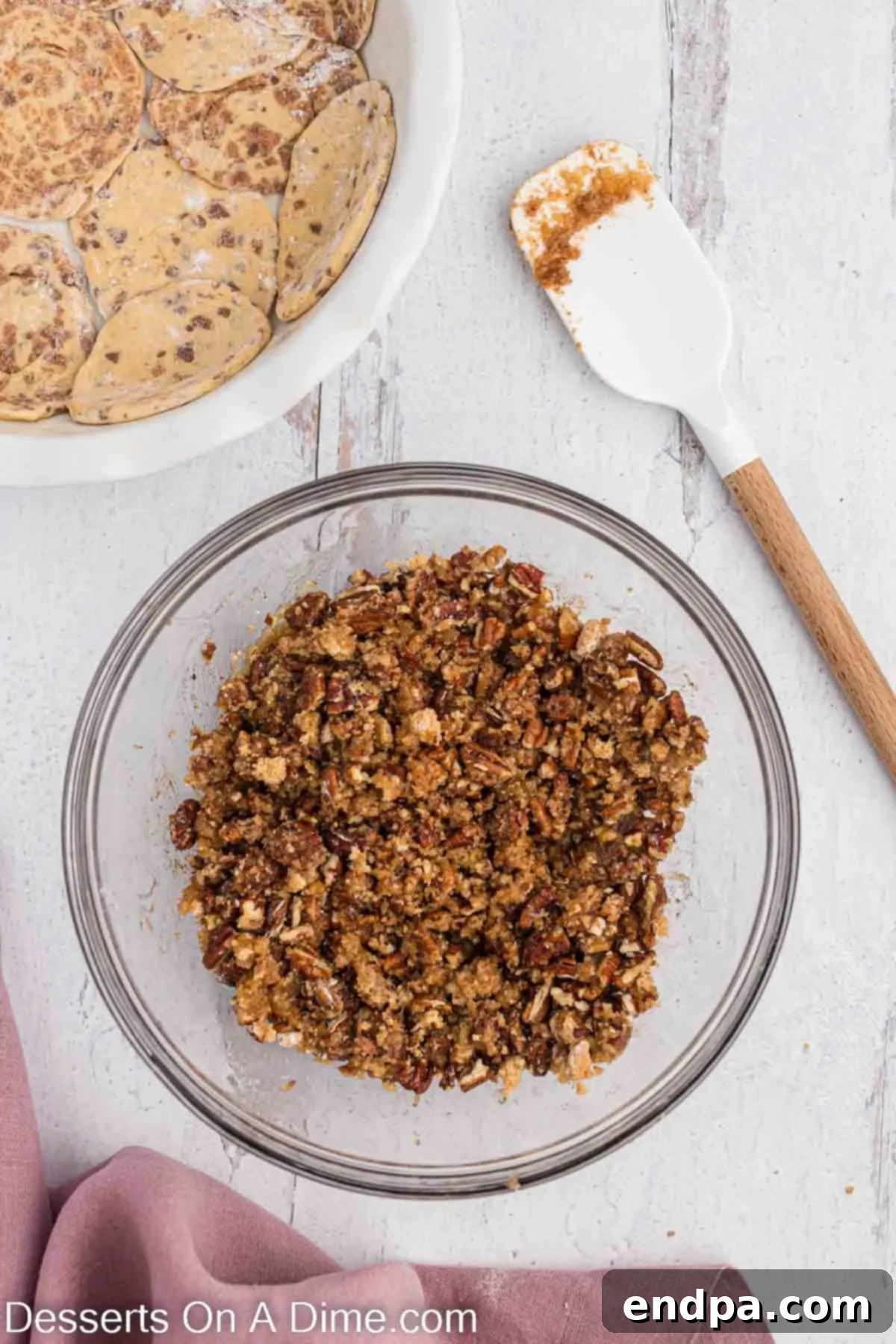 Homemade Cinnamon Roll Pie 8 Chopped pecans stirred into the brown sugar and butter mixture, creating a rich, nutty filling.
