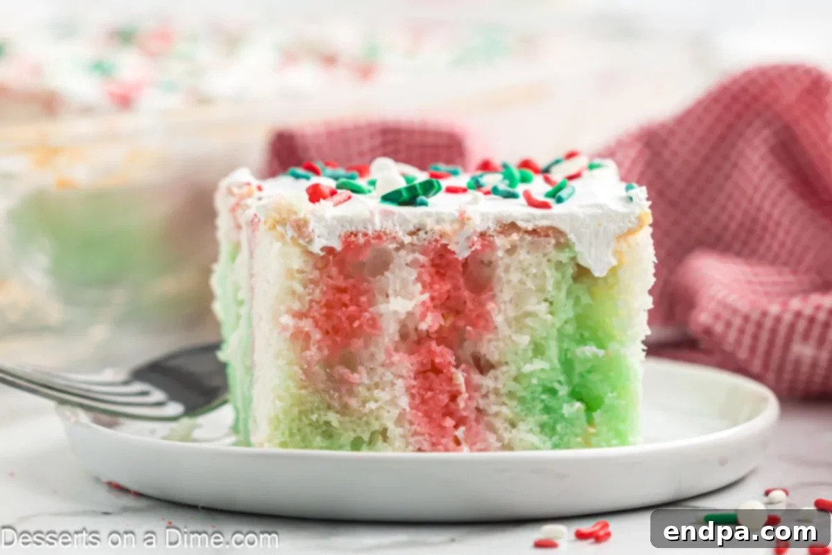 Christmas poke cake cut and served. 