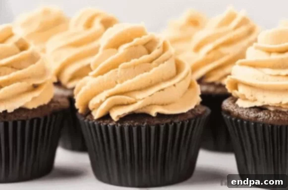 Touchdown Desserts: 55 Recipes for Your Super Bowl Party 5 Chocolate Peanut Butter Cupcakes with creamy peanut butter frosting.
