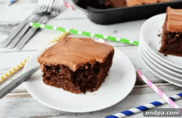 Touchdown Desserts: 55 Recipes for Your Super Bowl Party 6 A slice of rich Chocolate Coca Cola Cake with fluffy frosting.