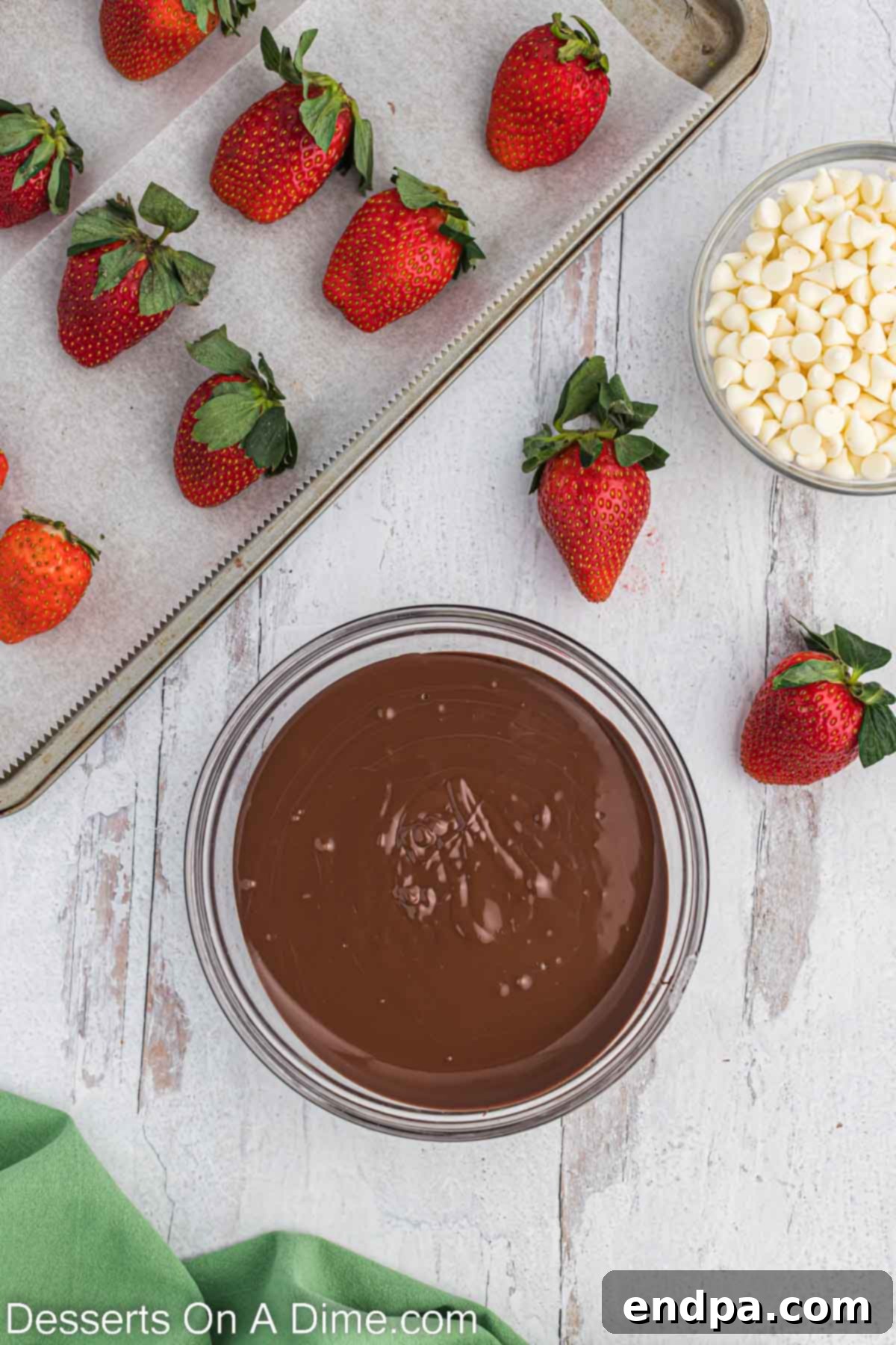 Touchdown Chocolate Strawberries 4 Melted chocolate in bowl.