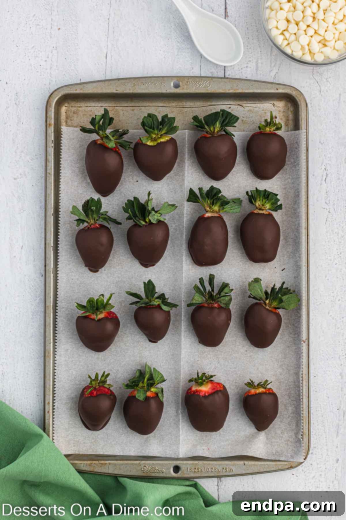 Touchdown Chocolate Strawberries 5 Chocolate covered strawberries on sheet pan.