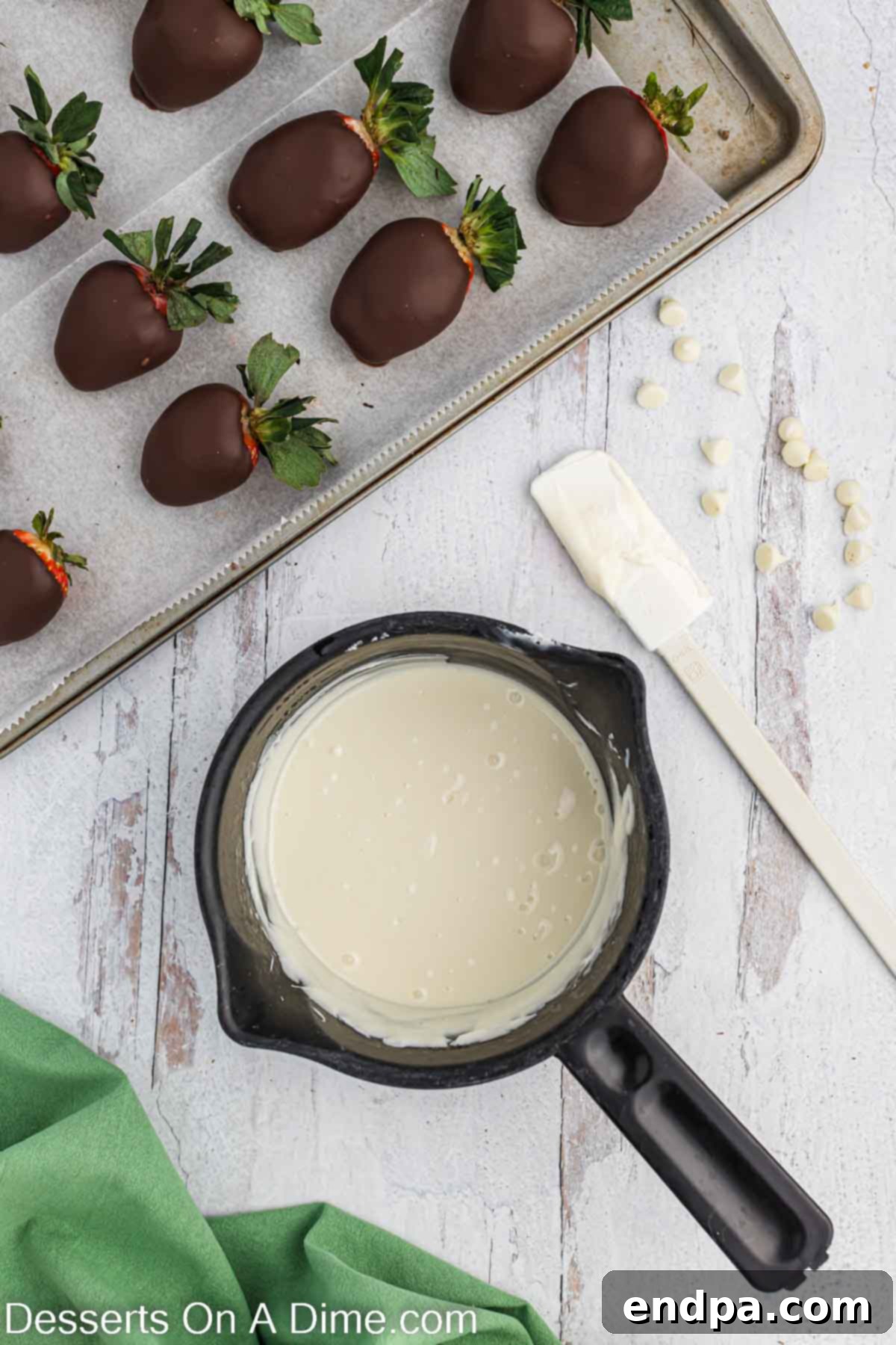 Touchdown Chocolate Strawberries 6 Melted white chocolate ready to go on berries.