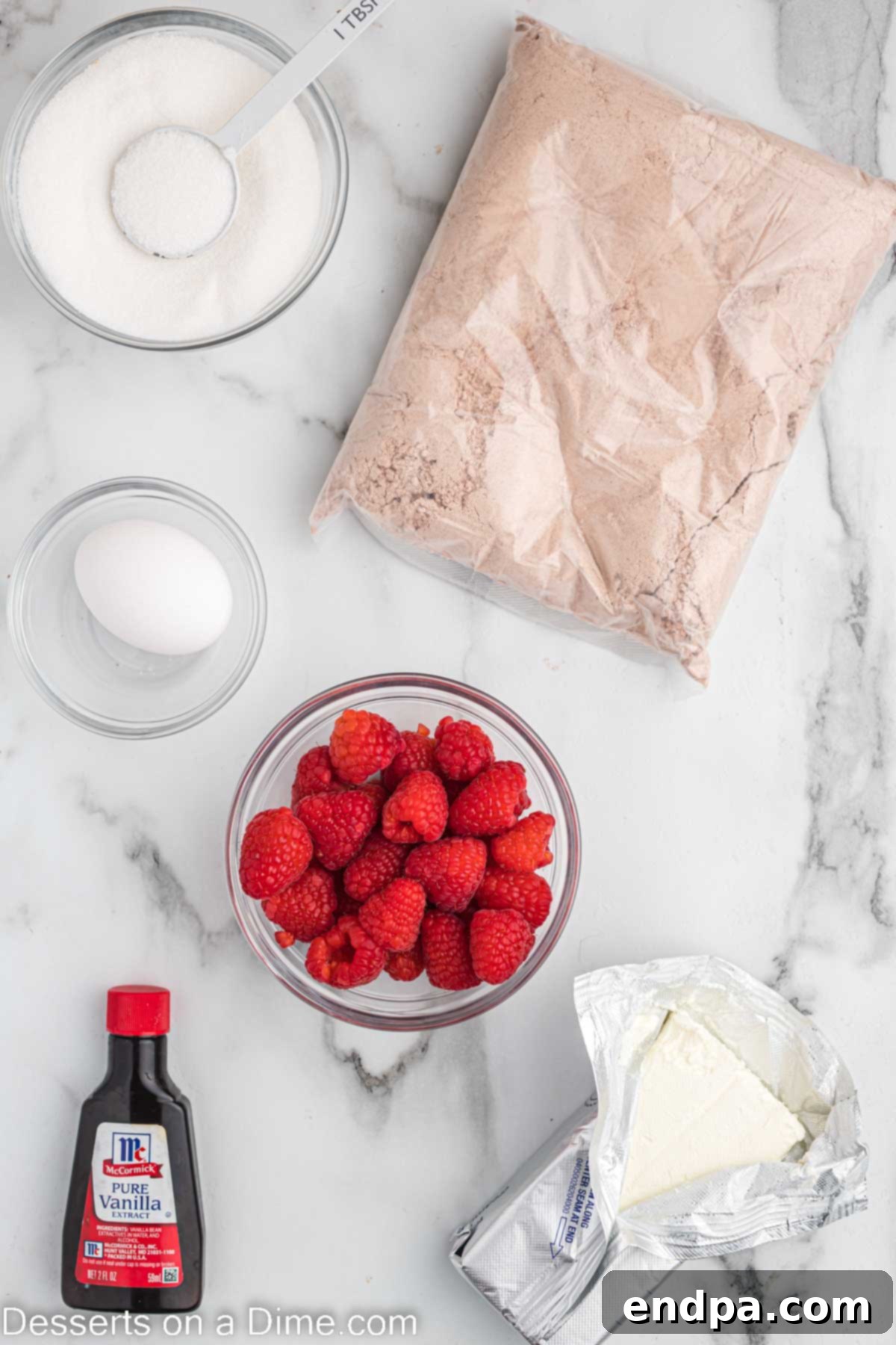 Ingredients needed - brownie mix, cream cheese, egg, vanilla, sugar, fresh raspberries