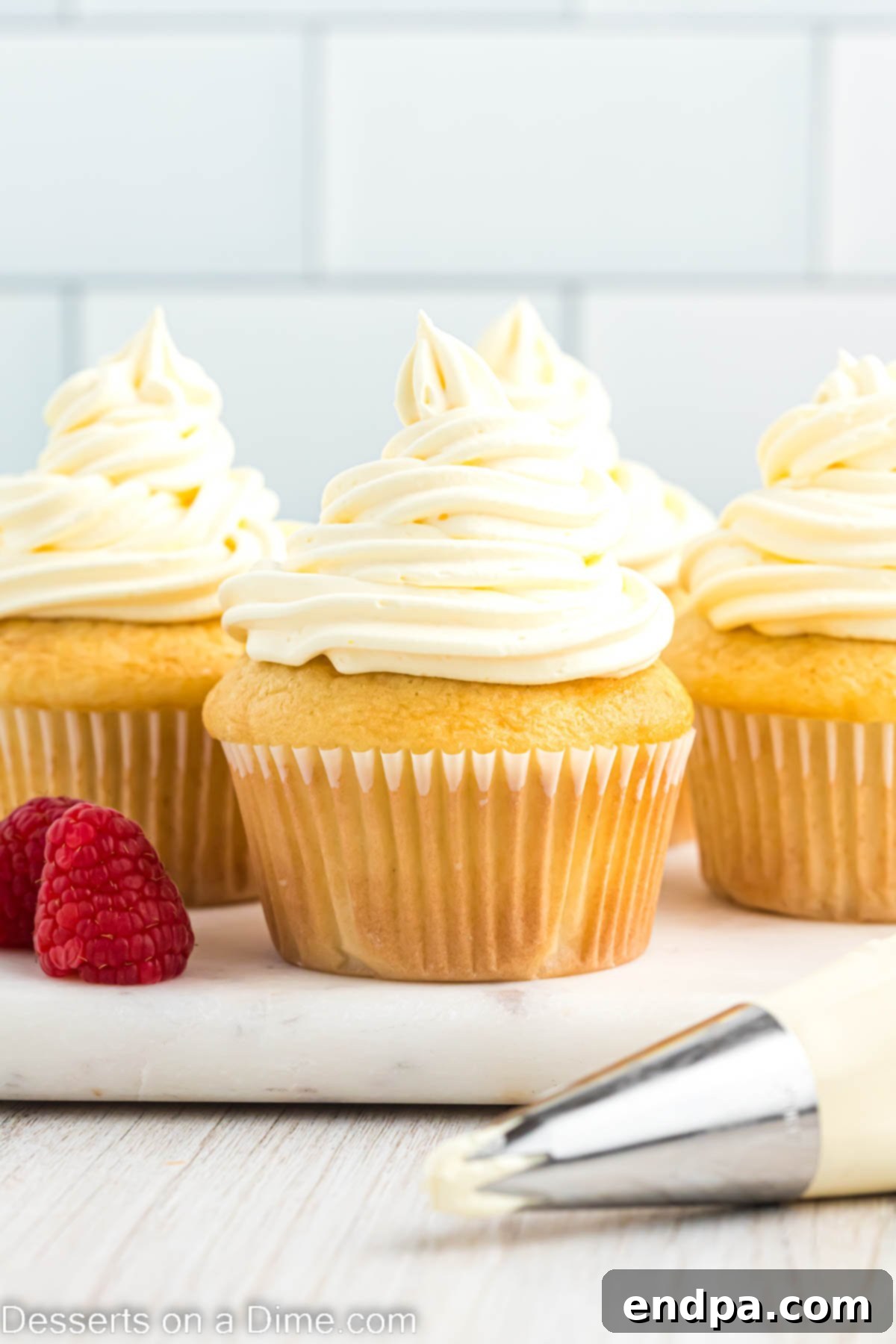 Super Fluffy Cool Whip Frosting 2 Cool whip frosting on a cupcake, showcasing its light and airy texture.