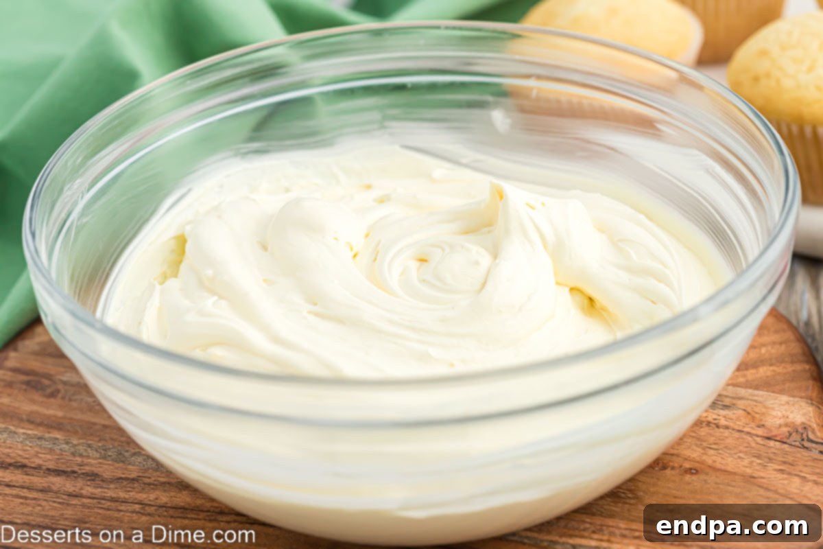 Super Fluffy Cool Whip Frosting 6 Finished Cool Whip frosting in a bowl, ready for refrigeration.