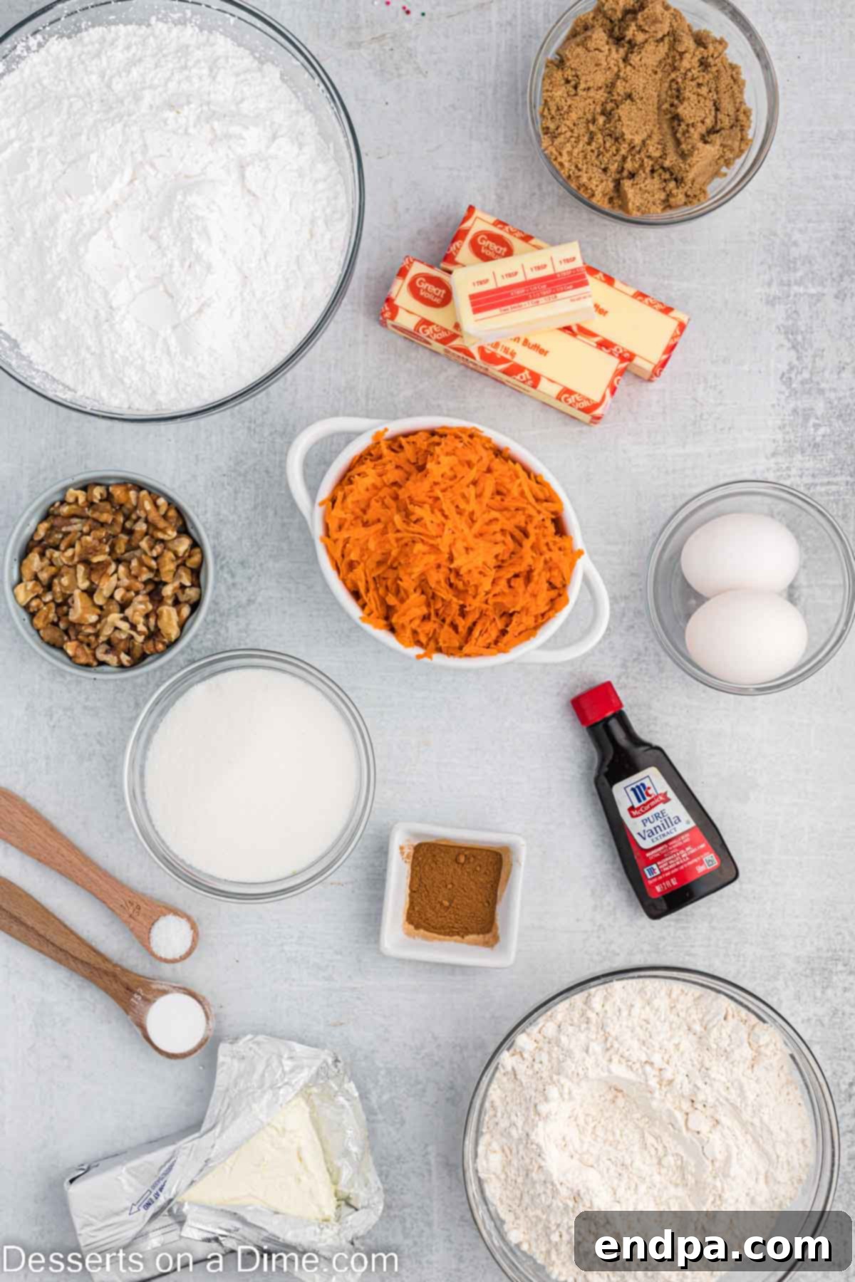 Ingredients for carrot cake cookies - butter, brown sugar, granulated sugar, eggs, vanilla, flour, cinnamon, baking soda, carrots. 
