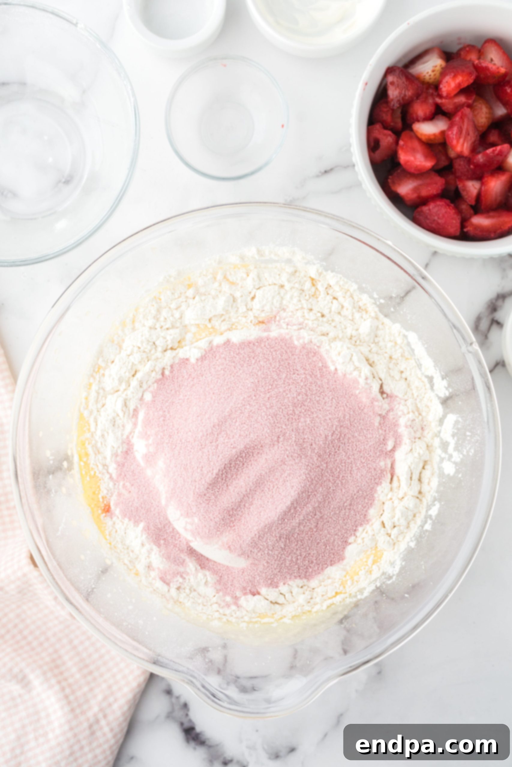 Zesty Strawberry Lemon Bundt Delight 5 Gelatin powder added to flour mixture.