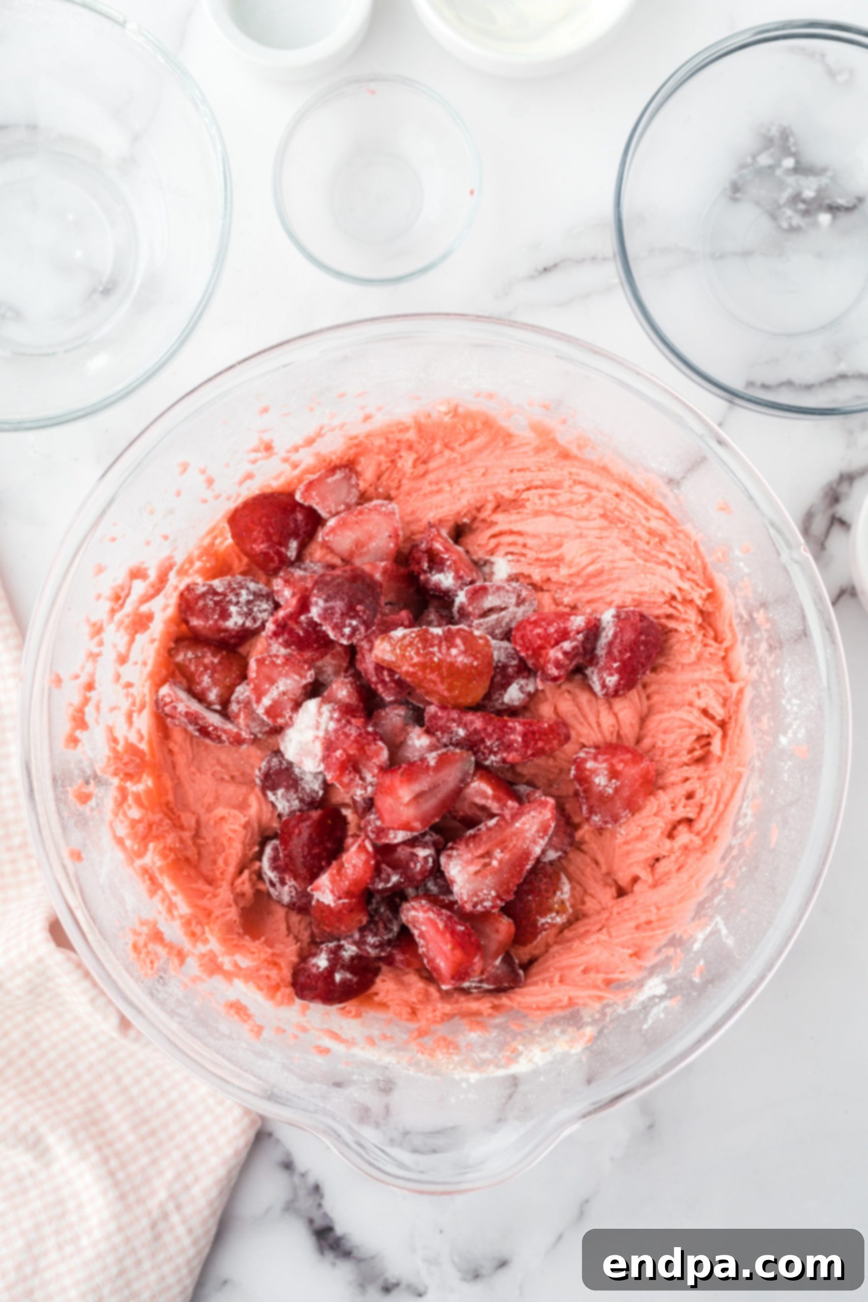 Zesty Strawberry Lemon Bundt Delight 6 Strawberries added to mixture and folded in.