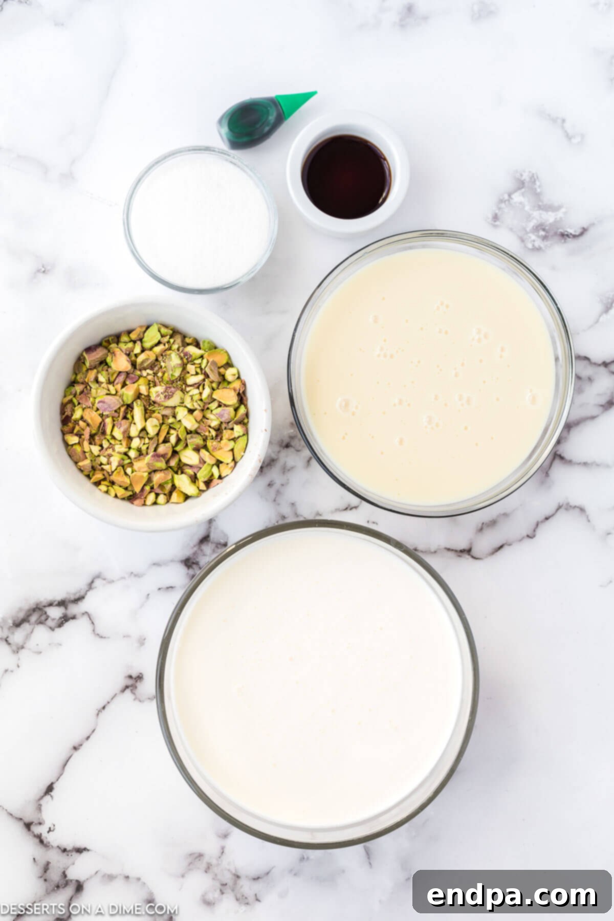 Emerald Dream Ice Cream 3 Ingredients for Pistachio Ice cream- heavy cream, sweetened condensed milk, vanilla, green food coloring, pistachios.