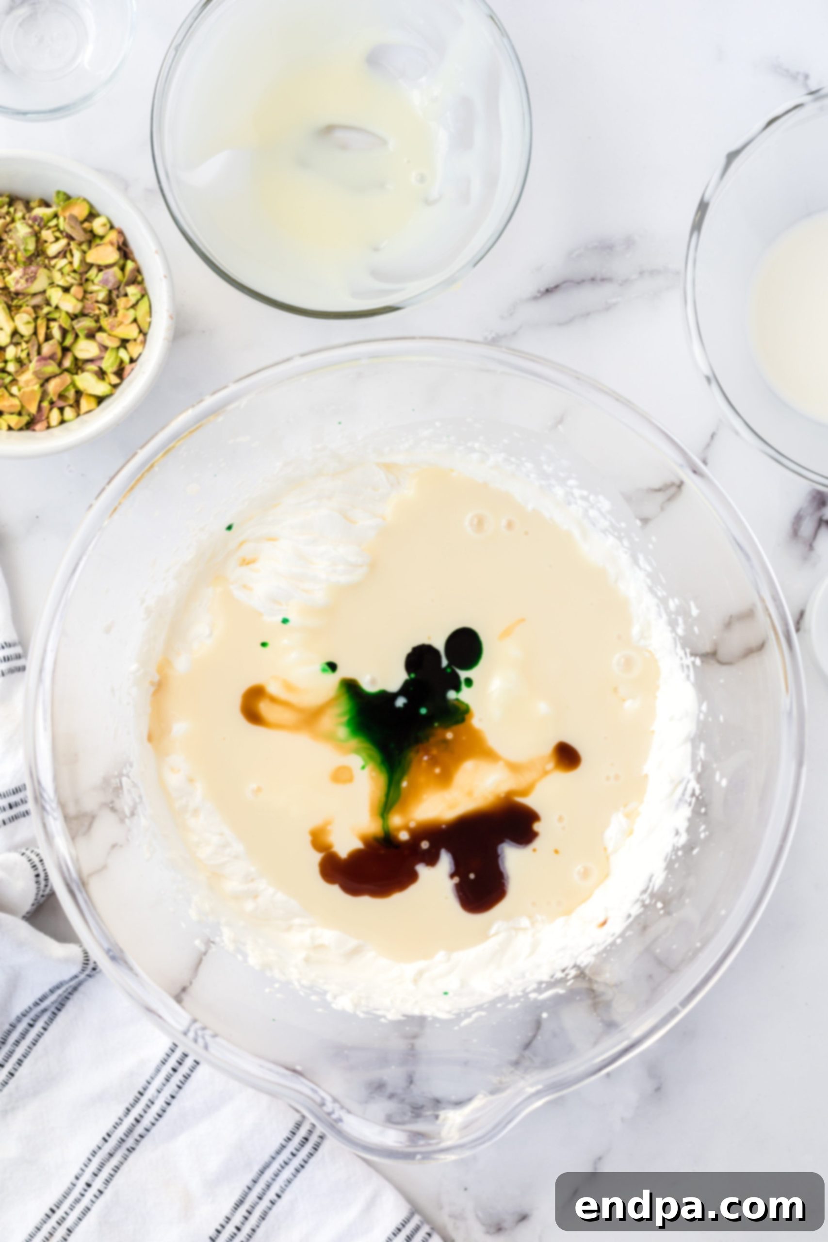 Emerald Dream Ice Cream 5 Mixing bowl with vanilla and food coloring.